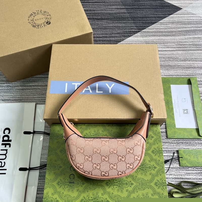 G*u*i top handle bags